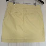 Loft Ann Taylor Butter Yellow Mini Skirt, worn once. Size 2. Beautiful color! Photo 1