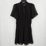 Socialite Black Sheer Smocked Waist Front Tie Mini Dress Photo 1