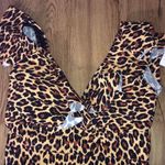  6 leopard swimsuit New swimsuit by cocoship ruffled flare straps smooth textured material. Photo 1