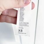 Fabletics Ines Low Impact Sports Bra in Coal Photo 7