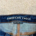 American Eagle  high rise shortie dark blue jean shorts in size 00 Photo 2
