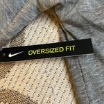 Nike dri-fit oversized gray training crop front pocket logo T-shirt Photo 6