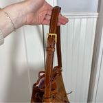 Dooney & Bourke  Pebble Grain Drawstring Hobo Bucket Bag Brown Pink Interior Photo 3