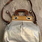 Francesco Biasia since 1977 handbag Gold shimmer bag with brown wooden handles and adjustable/removable brown leather crossbody strap. Tan Photo 0