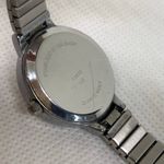 Women quartz analog watch silver tone 22mm oval stretch band size 7” running Photo 5