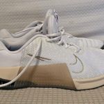 Nike White and Gold Athletic Sneakers Photo 0