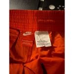 Nike  Womens Orange Athletic Shorts With Black Stripe Accents - Lightweight Photo 5