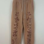 Urban Outfitters Out from Under Floral Patterned Tan Tie Waist Joggers Size Medium Photo 0