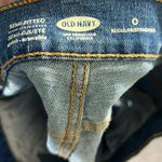 Old Navy NWT Denim Shorts Womens 0 Medium Wash Distressed Raw Hem Semi Fitted Photo 4