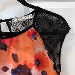 Chloe K Floral lightweight lace shoulder tee Photo 1