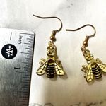 Gold tone and black bee earrings Photo 4