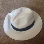 white paper hat with black band Photo 0