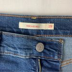 Levi's  size 29 Ribcage bell dark wash denim jeans raw hem flare retro Photo 2