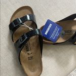Birkenstock  Glossy Black Double Strap Sandals Photo 1
