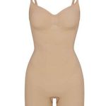 SKIMS Seamless Sculpt Mid Thigh Bodysuit Photo 0