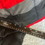 Swiss alps puffy red black jacket Size M Photo 4