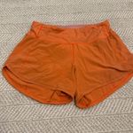 Lululemon  Orange Speed Up Shorts Photo 0
