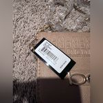 Bebe Taupe Embossed Logo Crossbody Bag with Gold Chain Strap Photo 6