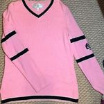 St. John RARE Sport size small pink and black sweater emblem on left arm Photo 0