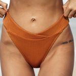 BERLOOK Caramel V Cut Jacquard Bikini Bottom ONLY 59 Orange Size L Photo 0