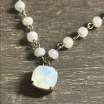 This is a moonstone beaded bracelet with a cushion Photo 1