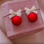 Red and Gold Bow Ornament Earrings Photo 3