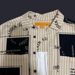 Urban Outfitters Striped Button-Up Top Photo 1