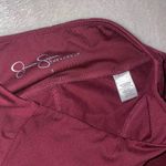 Jessica Simpson “The Warmup” Maroon Star Leggings size Small Photo 6