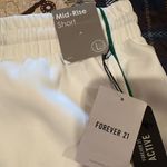 Forever 21 Womens Mid Rise Running Short-Juniors white green trim size L NWT Photo 2