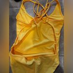 Tiger Mist Yellow body suit.  Photo 1