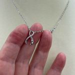 A.U. Ribbon and Hope Rhodium plated CZ necklace. Silver Photo 4