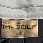 Skechers  performance go golf skorts size 4 button zip closure with pockets Photo 4