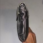 SILVER CLUTCH FAUX LEATHER RHINESTONE DESIGN 2 SNAP CLOSURE
ZIP POCKET OUTSIDE Photo 4