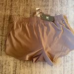 New Balance  Women's Athletic Shorts in Taupe Photo 2
