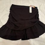 Glam Black skirt by  size large Photo 0