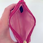 Coach  wristlet with iconic horse and carriage logo. Photo 4