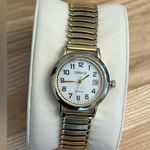Carriage Ladies Watch Indiglo White Dial Gold Tone Stretch Bracelet Date Window Photo 2