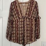 Forever 21 long sleeve boho jumpsuit with plunging neck line. Photo 0