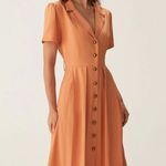Rihoas Orange V Neck Pleated Button Midi Dress Photo 0