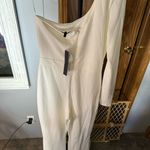 Symphony White One-Shoulder Jumpsuit with Rhinestone Detail by  Photo 1