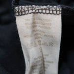 Free People  Cotton Modal Ultra Soft Stretch Fringe Tassel Detail Black Tee Shirt Photo 2