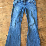 Silver Jeans Silver bootcut, distressed raw hem jeans Photo 0