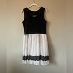 Enfocus Studio   Black and white dress with polka dots and lace detail at hem Photo 2
