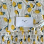 Soho Girls Yellow and Green Peplum Blouse with Cap Sleeves Photo 4