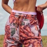 Free People Movement NWOT  The Switchback Nylon Floral Shorts in Hibiscus Photo 0