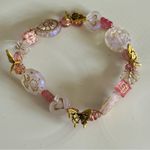 Pink and Gold Beaded Bracelet with Butterfly Charms Photo 1