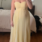 Yellow pleated dress Size L Photo 0