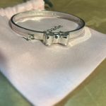 Kate Spade  New York Silver Plated Ready Set Bow bangle EUC Photo 0