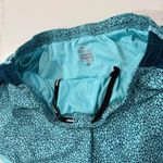 Nike Dri-Fit Tempo Running Shorts Women’s Small Teal Green/Geometric Dot Print Photo 3