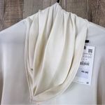 ZARA Scarf Collar Long Sleeve Blouse in a Cream Color The Cuffs have 3 Button Photo 2